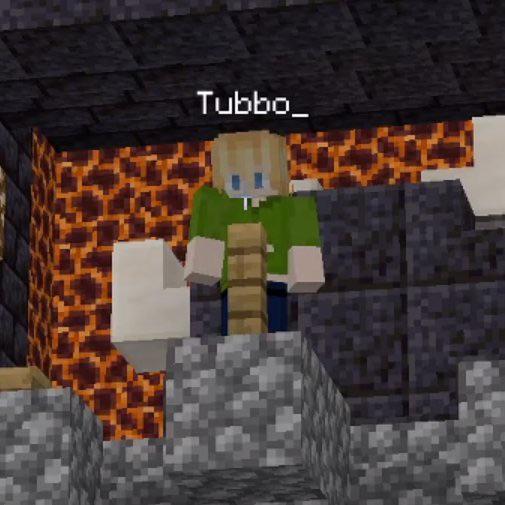 This is a screenshot from someone's stream. It shows Tubbo standing on the Manburg stage speaking into the microphone.
